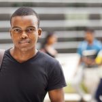 african college boy outdoors